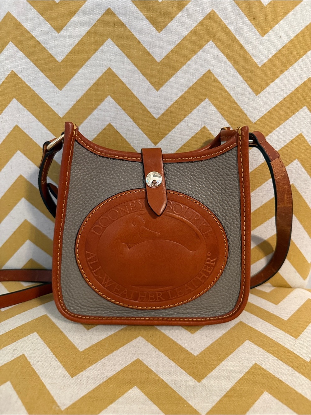 Dooney & Bourke Grey Pebbled Leather Heritage Duck Mini Messenger Crossbody